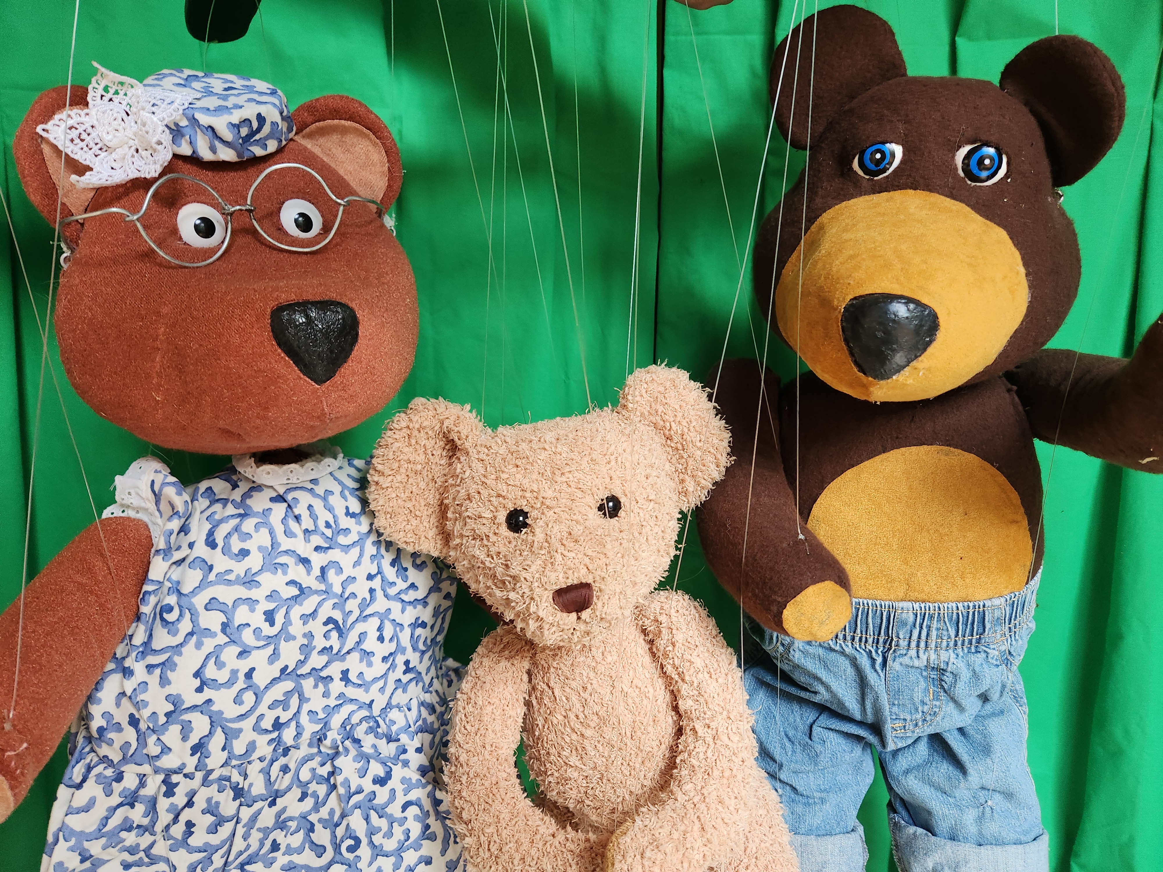 puppets of the three bears, mama bear, papa bear, and baby bear