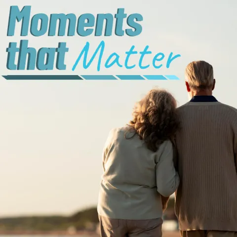 Moments that Matter Logo in the upper left corner overtop a photograph of an older couple walking into a sunset. This is a program for Ninety Six Adults.